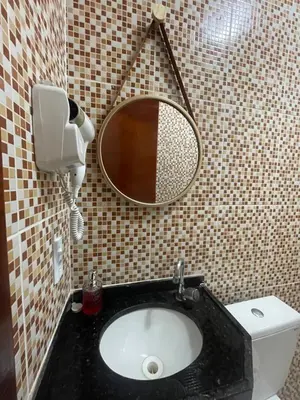 Uma casa de banho em Apartamento Império das Marés