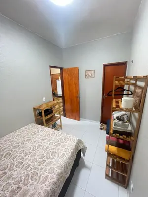 Uma cama ou camas num quarto em Apartamento Império das Marés