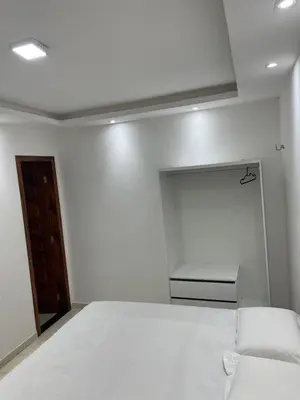 Uma cama ou camas num quarto em Flat Davitoria Flecheiras