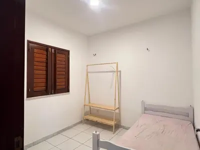 Uma cama ou camas num quarto em Casa Paracuru