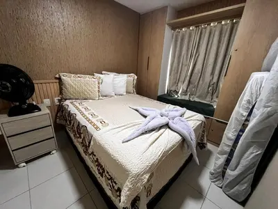 Uma cama ou camas num quarto em Vg Sun Cumbuco 112