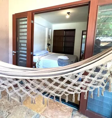 Uma cama ou camas num quarto em Seu cantinho na Praia do Cumbuco