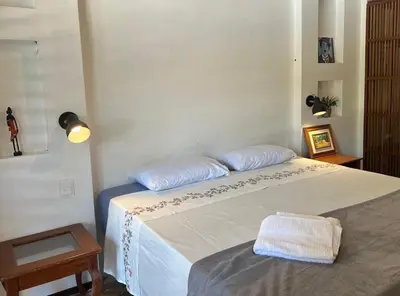 Uma cama ou camas num quarto em Seu cantinho na Praia do Cumbuco