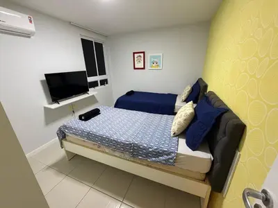 Uma cama ou camas num quarto em Terramaris vista mar