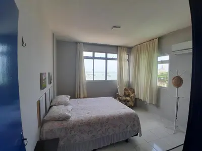 Uma cama ou camas num quarto em Magnata praia