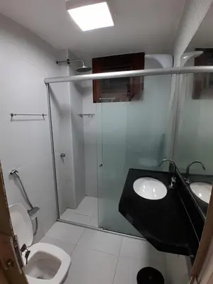 Uma casa de banho em Magnata praia