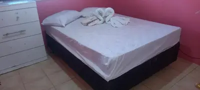 Uma cama ou camas num quarto em Ambiente agradável