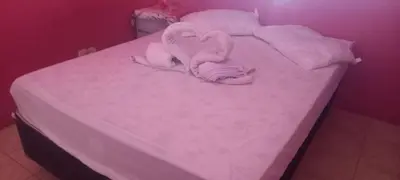 Uma cama ou camas num quarto em Ambiente agradável