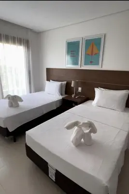 Uma cama ou camas num quarto em Resort Coral Beach - Casa 18