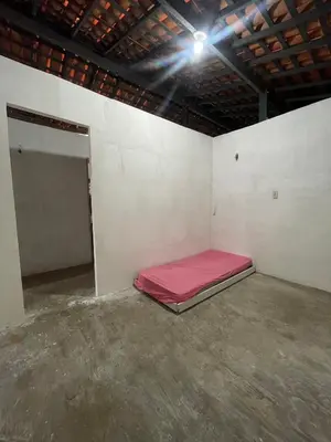 Uma cama ou camas num quarto em Casa brisa do mar icapuí