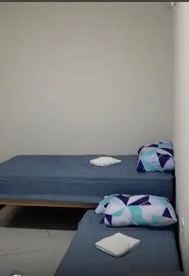 Uma cama ou camas num quarto em Leisure with family or friends, close to the beach