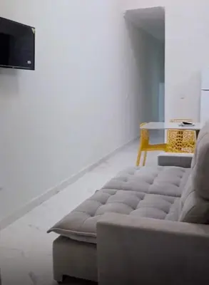 Uma televisão e/ou sistema de entretenimento em Leisure with family or friends, close to the beach