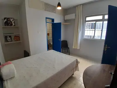 Uma cama ou camas num quarto em Recanto do sol