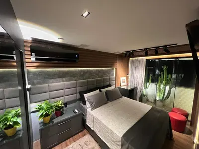 Uma cama ou camas num quarto em Suite com vista incrivel Porto Jangada