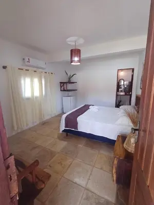 Uma cama ou camas num quarto em house in icaraizinho de amontada