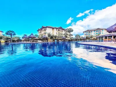 A piscina em ou perto de VG SUN Cumbuco - Apartamento pé na areia