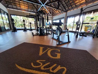 O centro de fitness e/ou as comodidades de fitness de VG SUN Cumbuco - Apartamento pé na areia