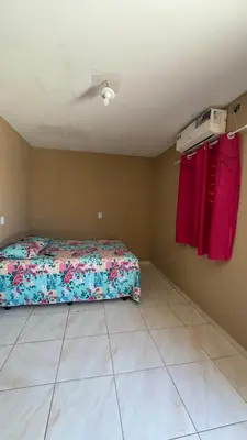 Uma cama ou camas num quarto em Deck morro branco