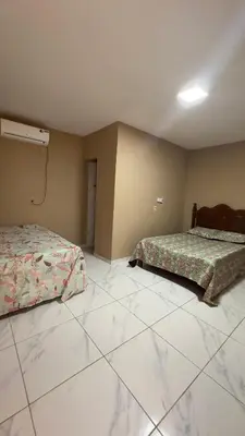 Uma cama ou camas num quarto em Deck morro branco