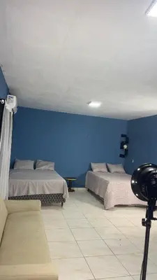 Uma cama ou camas num quarto em Deck morro branco