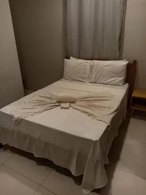 Uma cama ou camas num quarto em Rekanto Sabiá