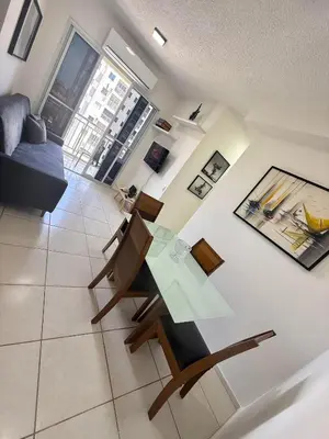 Uma área de estar em Apartamento Novo 2 quartos e vista mar 1001B