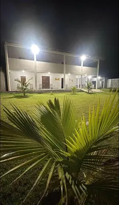 Um jardim no exterior de Pousada Buson Beach