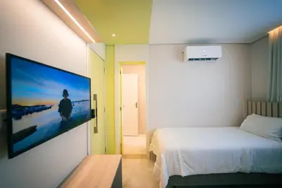 Uma cama ou camas num quarto em Vibes Beach House