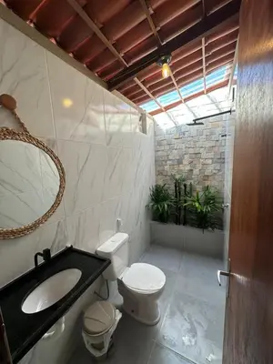 Uma casa de banho em Maruva Chalé