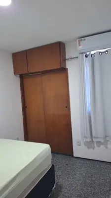 Uma cama ou camas num quarto em Flat atlantico 1404