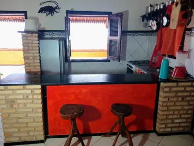 A cozinha ou kitchenette de Chales lua mar e sol