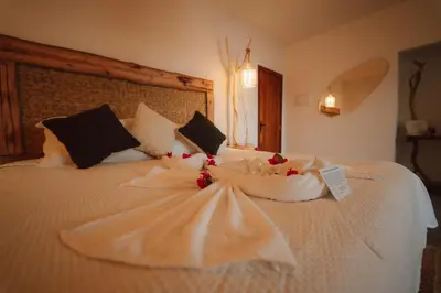 Uma cama ou camas num quarto em Ankura Preá Spa & Boutique Hotel