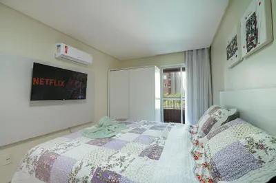 Uma cama ou camas num quarto em Scopa Beach #C3-200 - Pé na areia By Carpediem