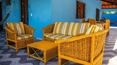 Uma área de estar em Sítio Helena - Casa de praia