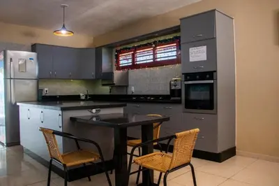 A cozinha ou kitchenette de Sítio Helena - Casa de praia