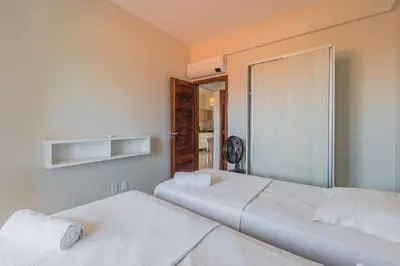 Uma cama ou camas num quarto em Cumbuco Residence #309 - 2 quartos by Carpediem