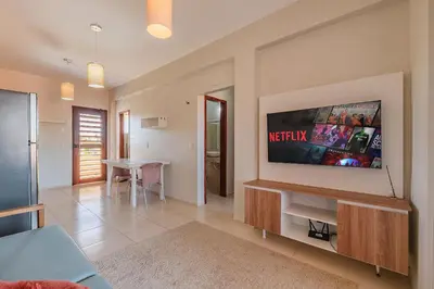 Uma televisão e/ou sistema de entretenimento em Cumbuco Residence #309 - 2 quartos by Carpediem