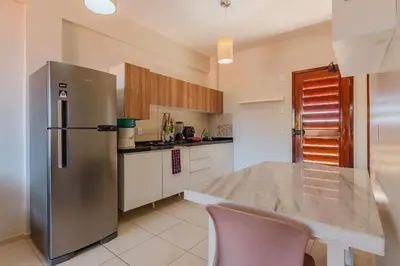 A cozinha ou kitchenette de Cumbuco Residence #309 - 2 quartos by Carpediem
