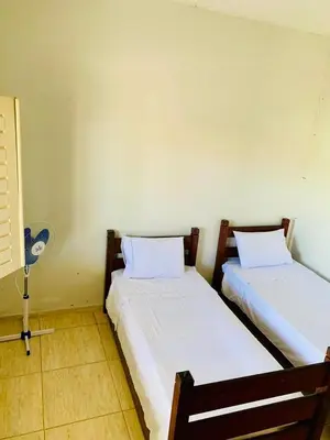 Uma cama ou camas num quarto em Casa na Prainha a 200 metros da praia