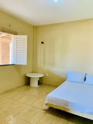 Uma cama ou camas num quarto em Casa na Prainha a 200 metros da praia