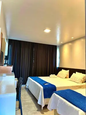 Uma cama ou camas num quarto em Atlas Beach Hotel