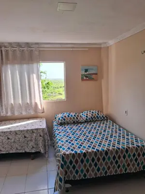Uma cama ou camas num quarto em Casa blue