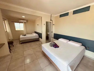 Uma cama ou camas num quarto em Pousada beira mar e sol