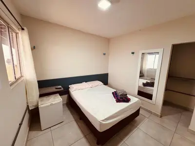 Uma cama ou camas num quarto em Pousada beira mar e sol