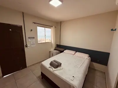 Uma cama ou camas num quarto em Pousada beira mar e sol