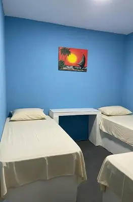 Uma cama ou camas num quarto em Casa 212