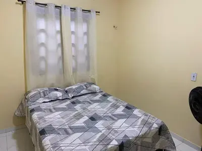 Uma cama ou camas num quarto em Casa aconchego Prea