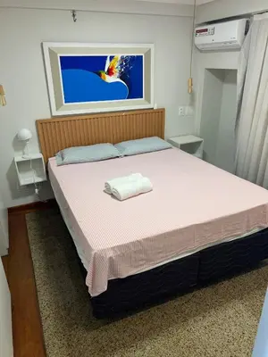 Uma cama ou camas num quarto em Scala by DS imoveis