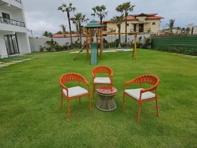 Um jardim no exterior de Conforto, lazer e otima localização - Beach Park