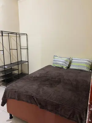 Uma cama ou camas num quarto em Casa Brisa do Mar